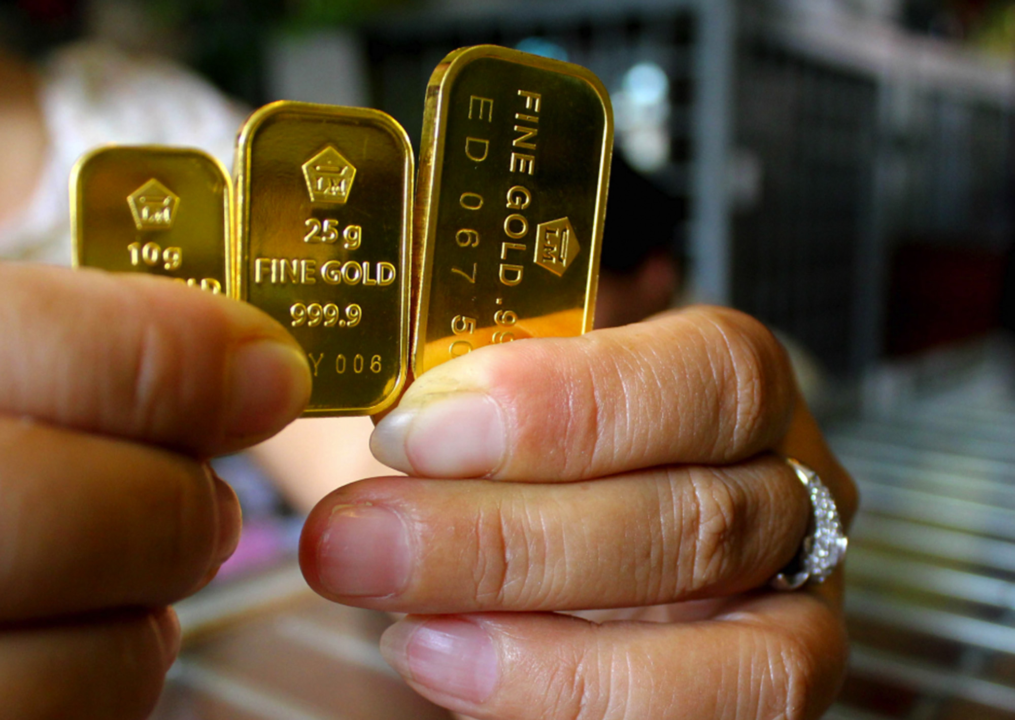 شراء سبائك الذهب من البنك الأهلي التجاري